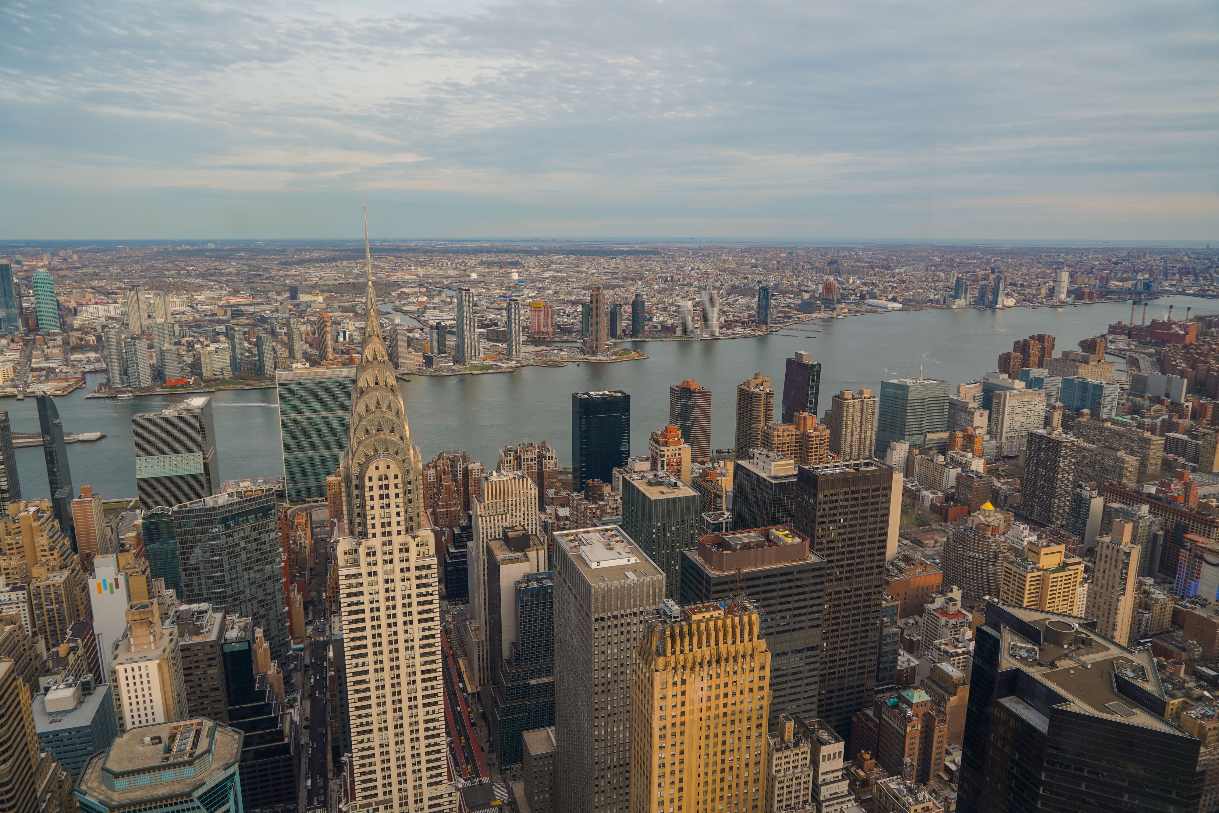 Aerial view of Midtown Manhattan with the Chrysler Building and the East River